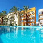 Apartment Homes With Cozy Terrace & 2 Swimming Pools Near The Heart